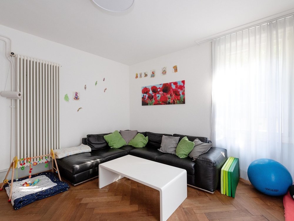 Wohnzimmer WG Alpenegg für Eltern und Kind